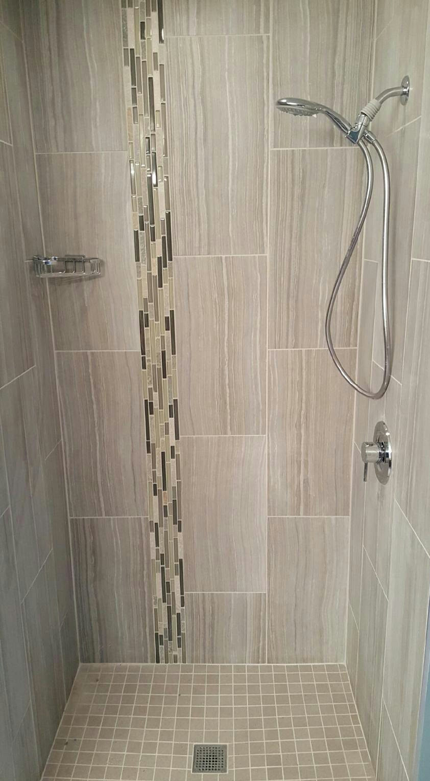 gray vertical rectangular tile with mosaic accent strip